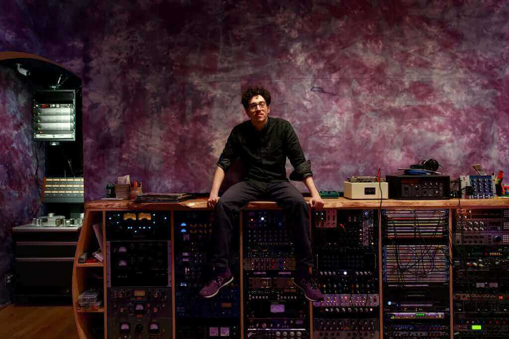 Ben Kane with Electric Garden’s extensive inventory of outboard gear (Brooklyn, NY). Photo by Shotti.
