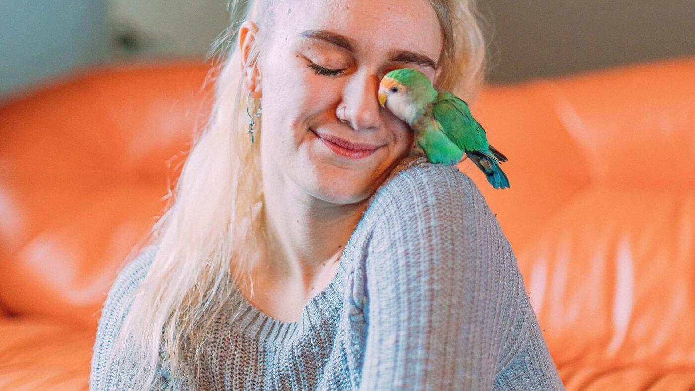 Blonde Girl with Pet Lovebird