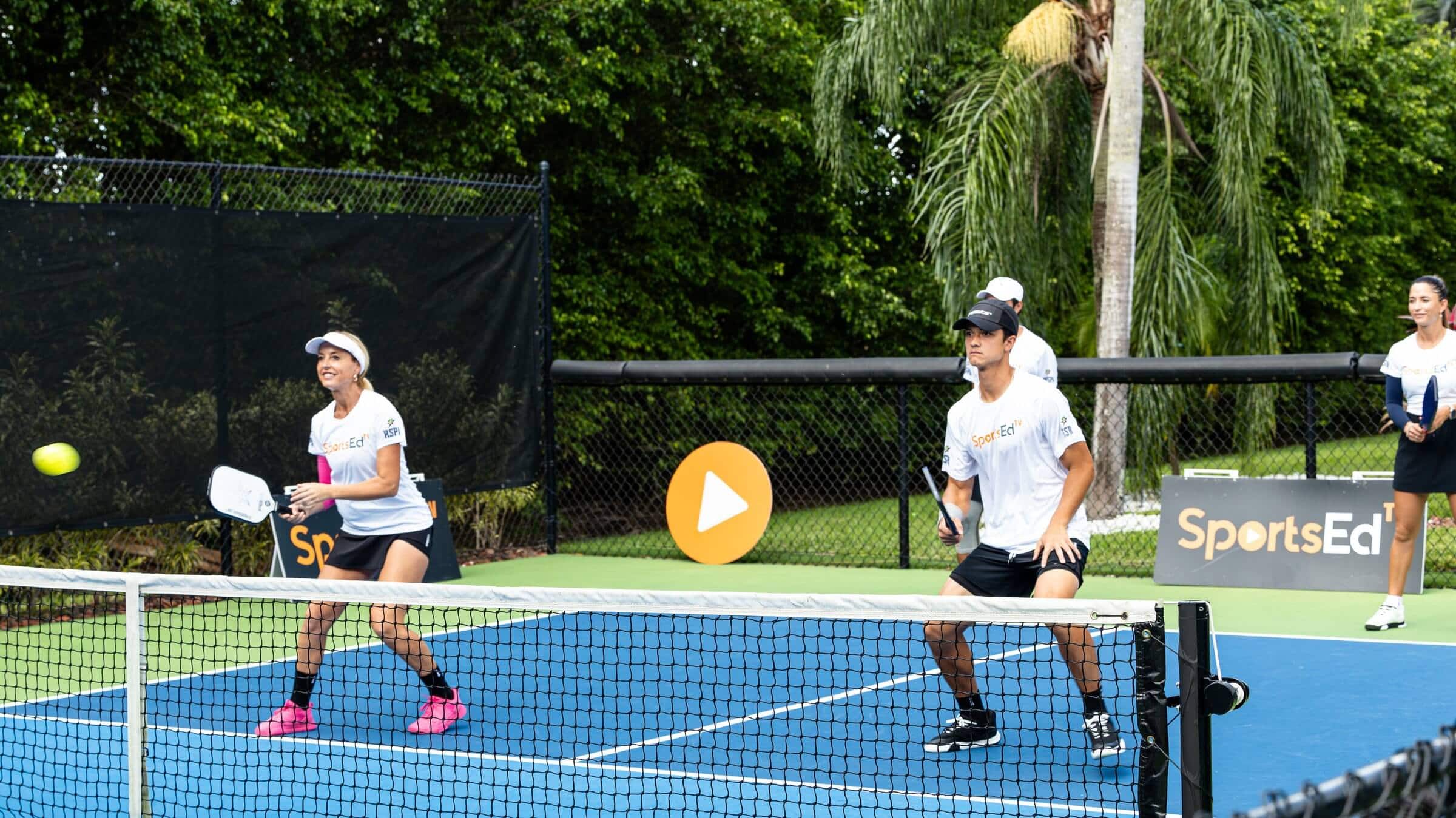 Doubles pickleball game on the court