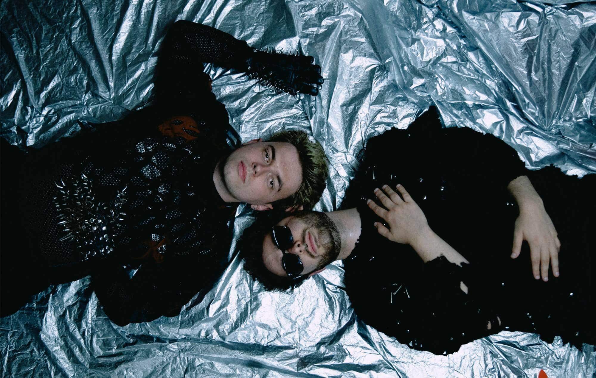 CHALK press shot - duo in moody lighting