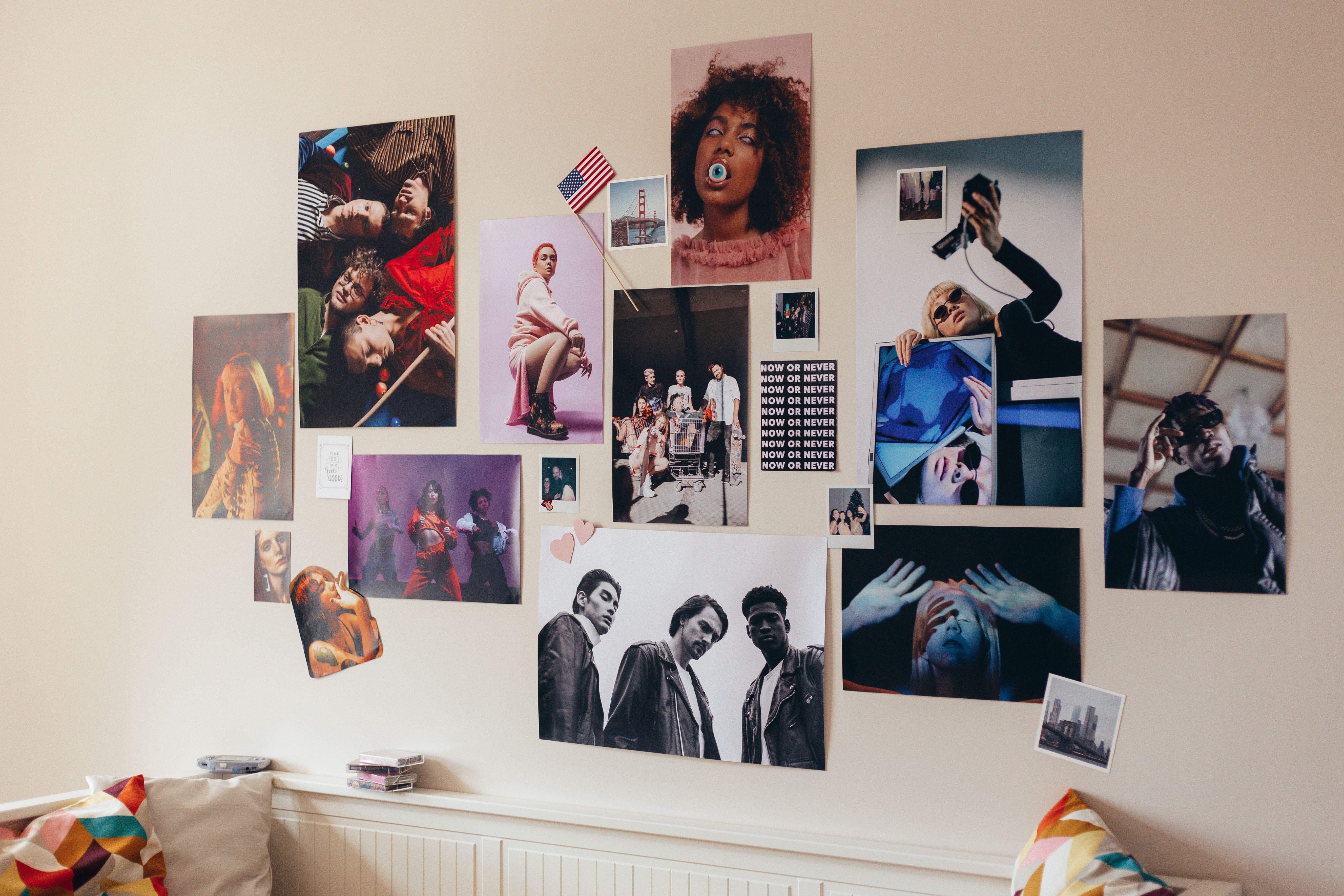Eclectic poster collage on a room wall, shown as general layout inspiration