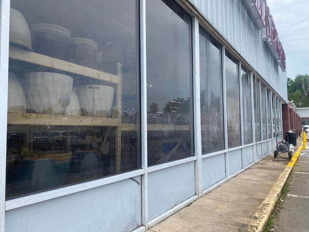 Close-up of building surface before Restore All cleaning
